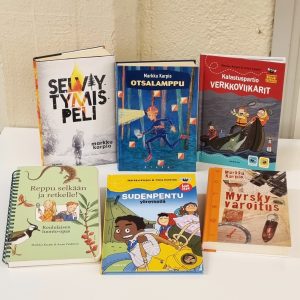 Kuvassa Markku Karpion kirjoja.