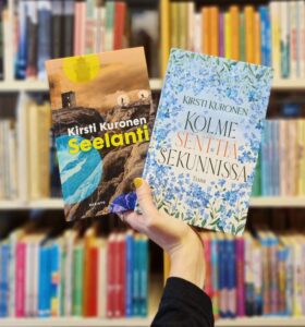 Kädessä kirjat Seelanti ja Kolme senttiä sekunnissa.